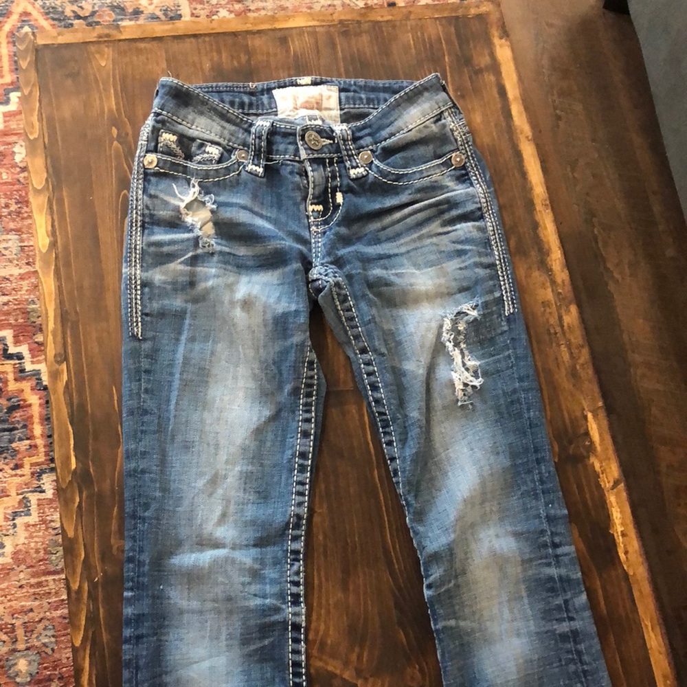 Buckle boot cut jeans